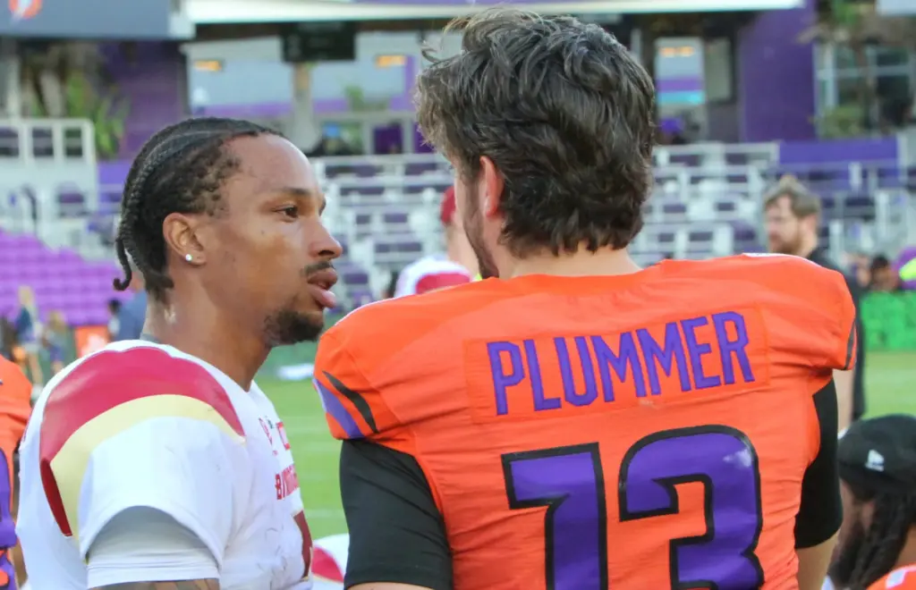 Former Orlando Storm quarterback Dorian Thompson-Roobinson greets current Storm quarterback...