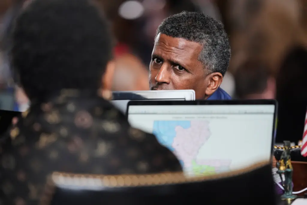 Louisiana Rep. Edmond Jordan, D-Dist 29, talks with fellow lawmakers...
