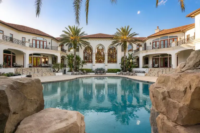 The new owners will enjoy a 125,000-gallon resort-style pool complete...