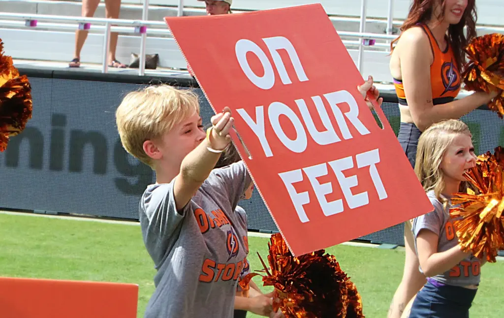 A young Orlando Storm Surge yell leader shows his support...
