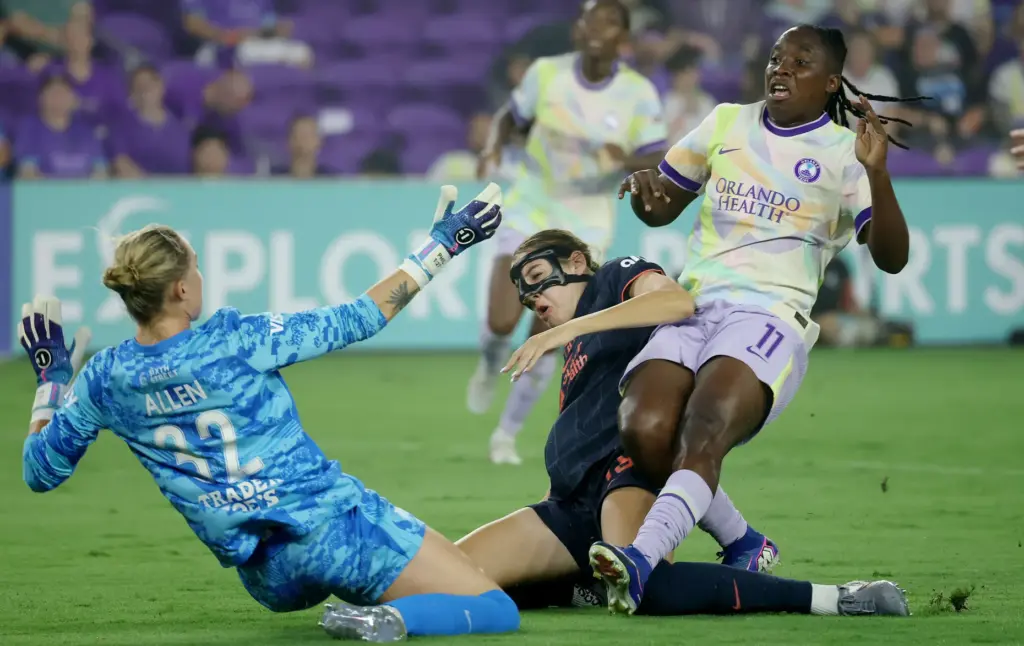 Orlando player Barbra Banda (11) scores a goal past Bay...