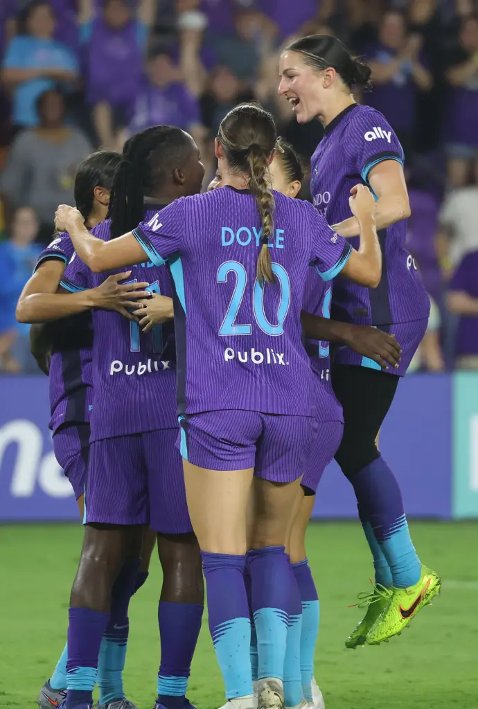 Orlando players celebrate after a goal during the North Carolina...