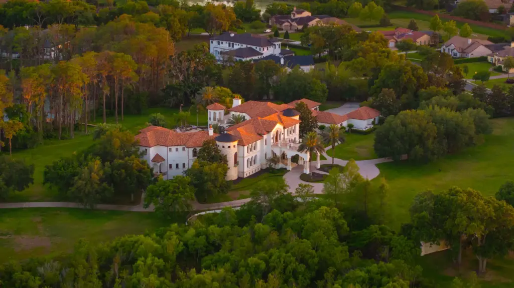 The walled, gated estate home sits on 11+ acres in...