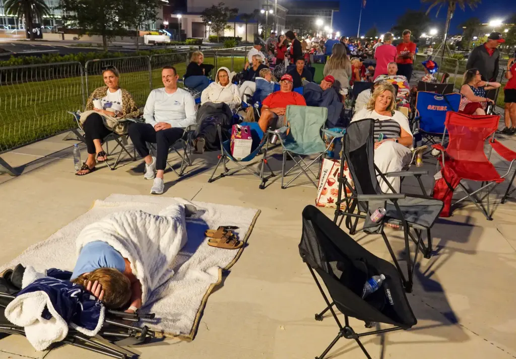 Nap time for a supporter of President Donald Trump while...