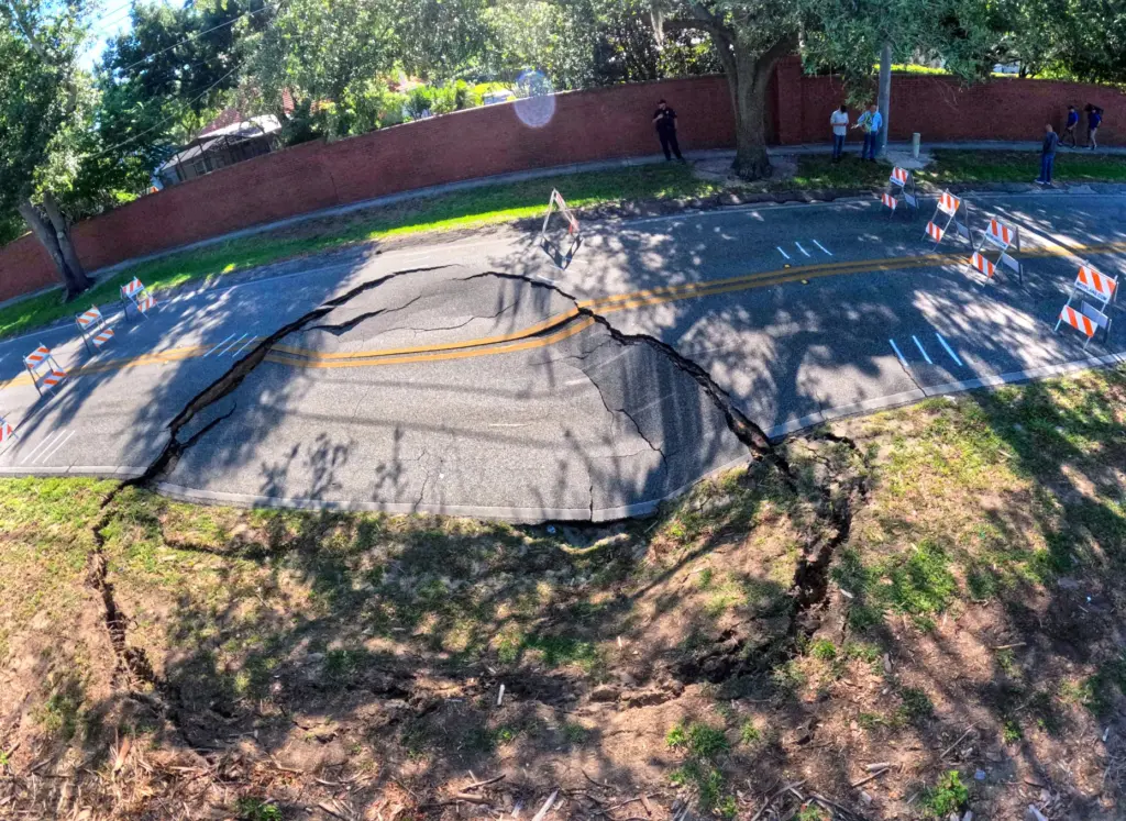 A sinkhole that opened early Friday has closed a portion...