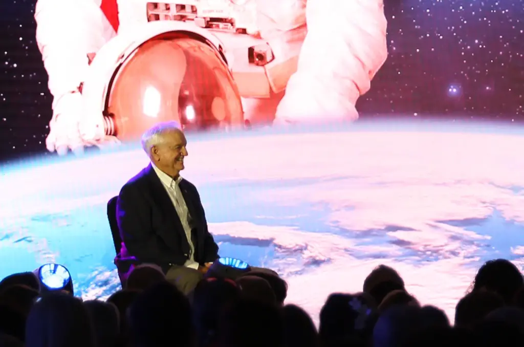 Former NASA astronaut Tom Akers listens to his introduction during...