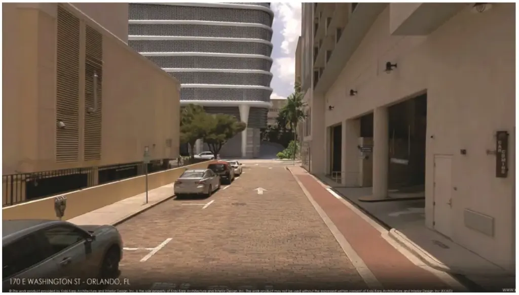 The ramp leading to the parking garage is on the...