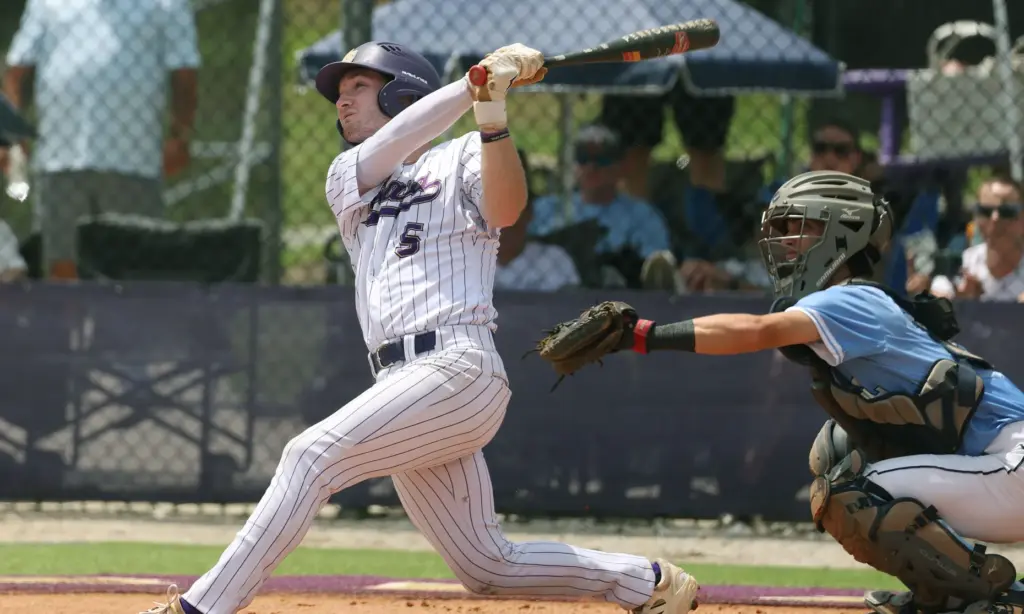 Winter Springs High baseball player Brandon Curl hits during the...