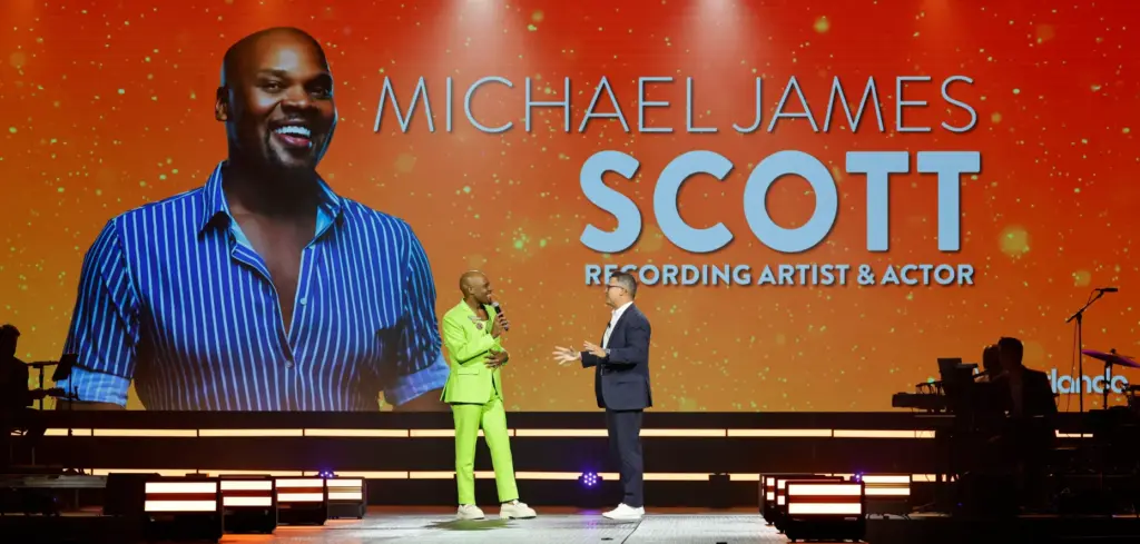 From left, recording artist and actor Michael James Scott talks...