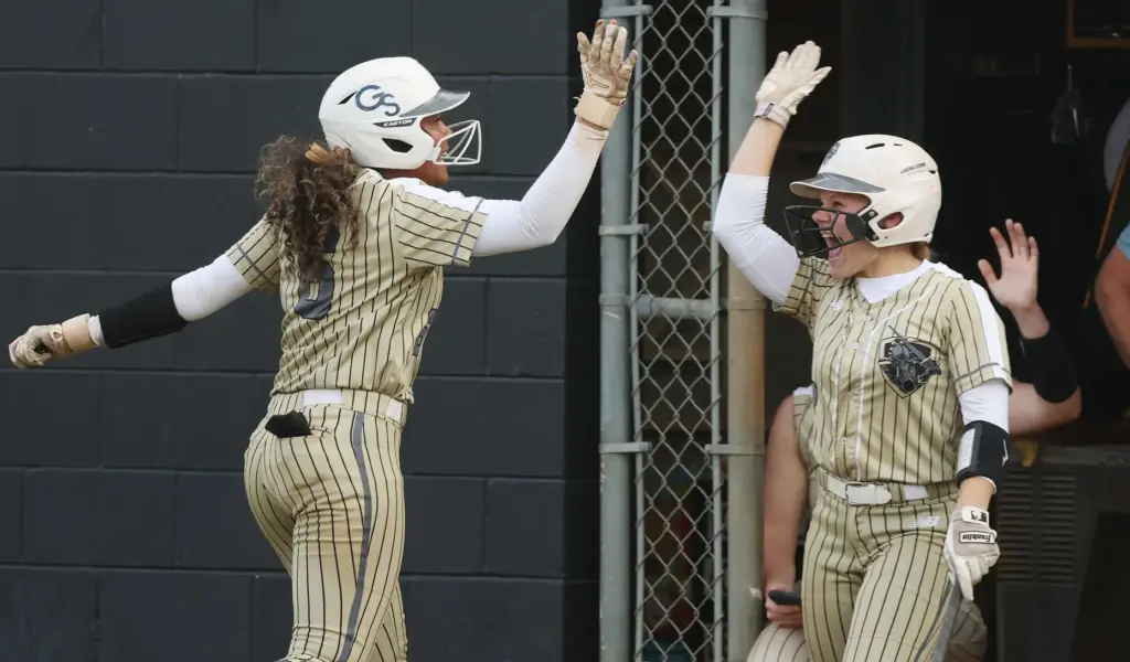 East Ridge High softball players Lelia Bolden (left) and Molly...