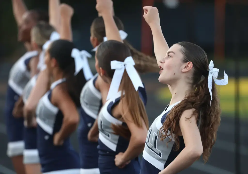 Lake Howell cheerleaders cheer during a Spring High School Football...