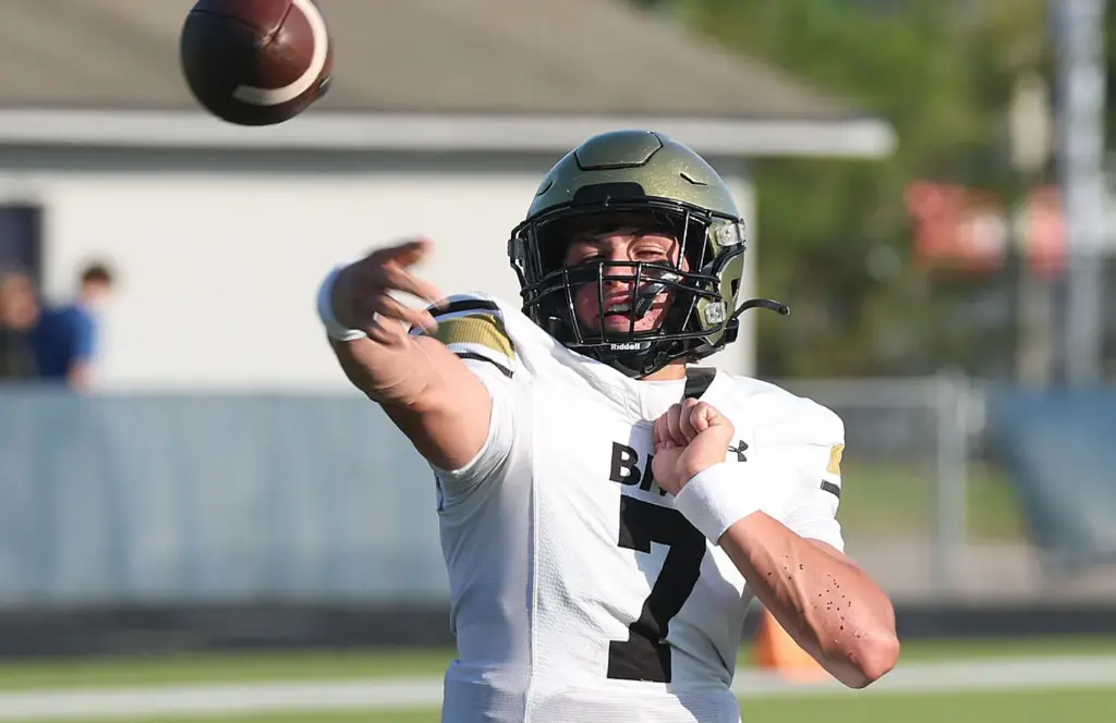 Bishop Moore quarterback Blake McCullough (7) throws during a Spring...
