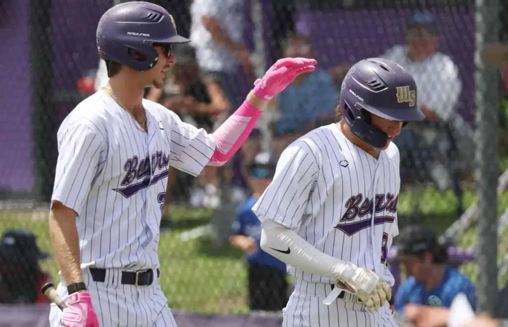 Winter Springs High baseball players Tyler Kenast (left) and Brandon...