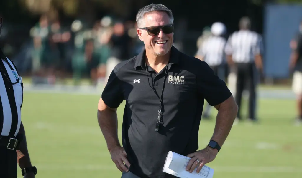 Bishop Moore coach Matt Hedrick smiles before a Spring High...