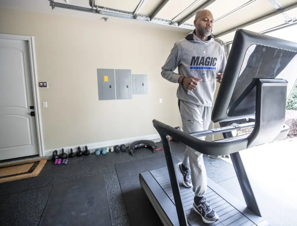 Orlando Magic head coach Jamahl Mosley gets a workout on...