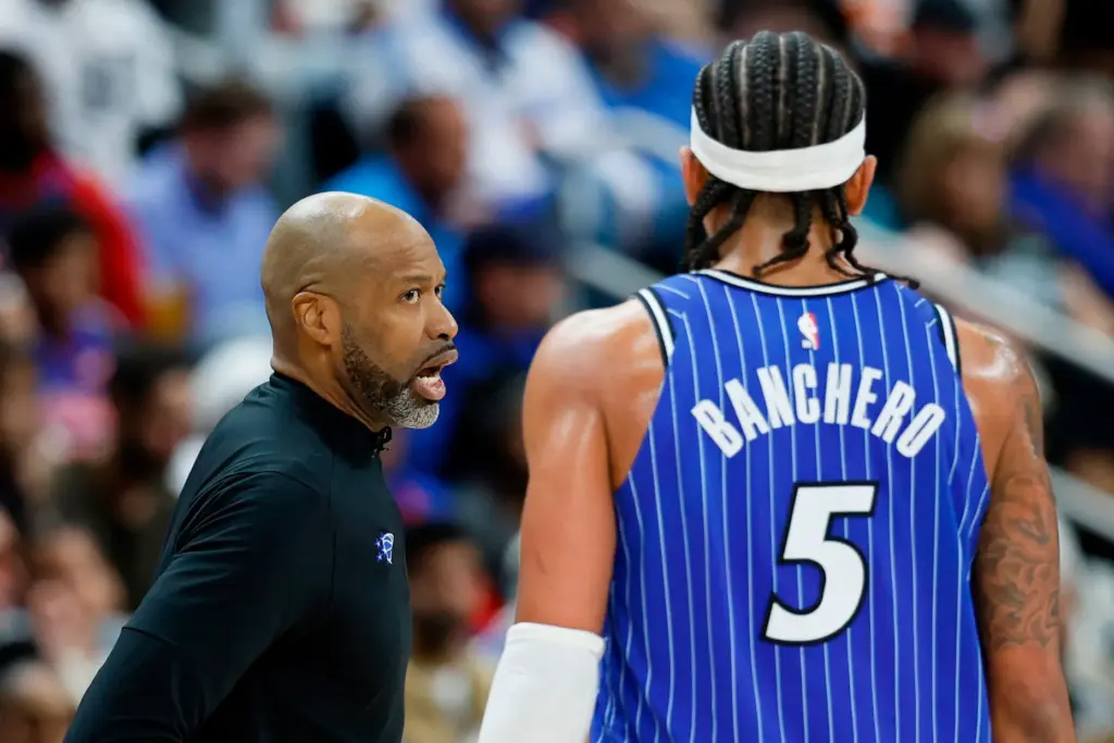 Orlando Magic head coach Jamahl Mosley talks with forward Paolo...