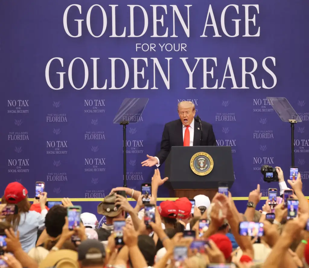 President Donald Trump delivers remarks to a cheering crowd at...
