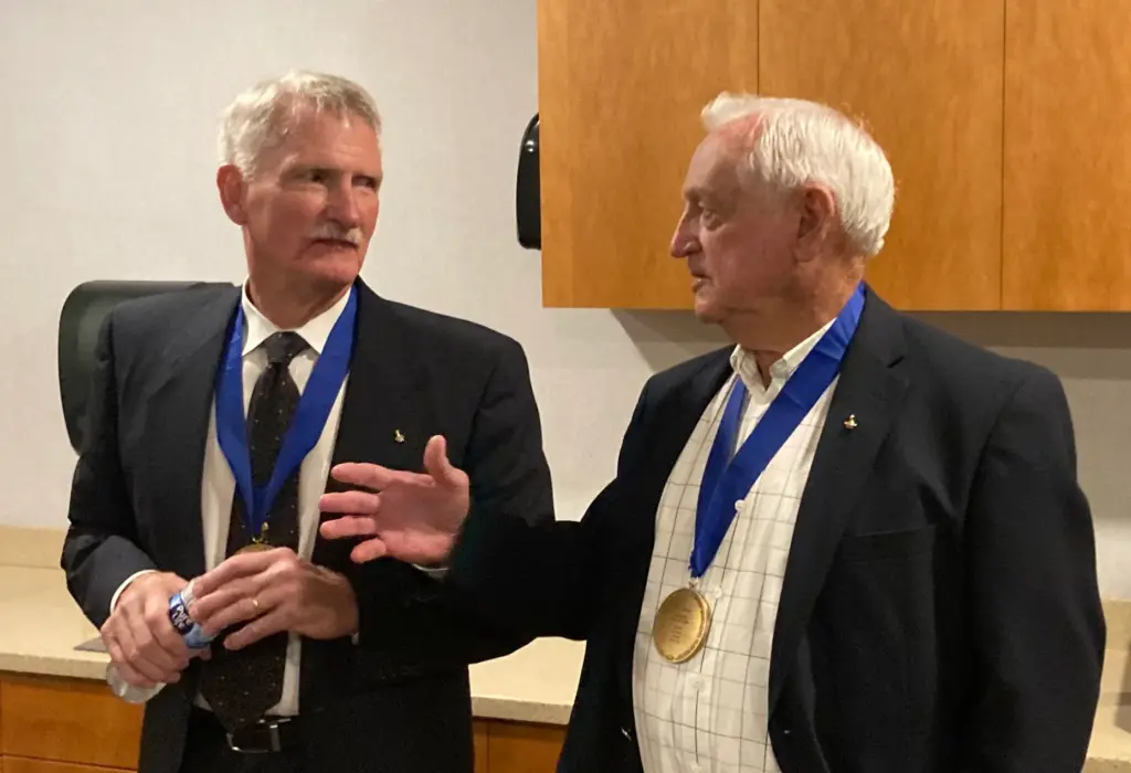 Former NASA astronauts Joe Tanner, left, and Tom Akers, speak...