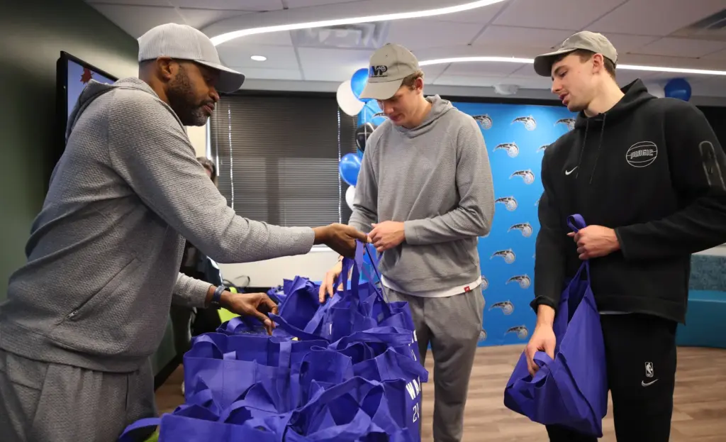 From left, Orlando Magic head coach Jamahl Mosley, with Moe...