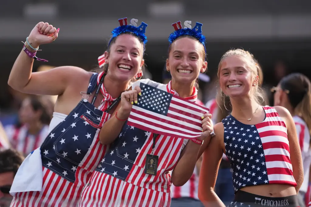 Fans of the United States wait for the beginning of...