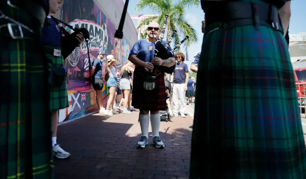 World Cup fans participate in the Scotland Tartan Army march through Little Havana to loanDepot park in Miami on Monday. (Carline Jean/South Florida Sun Sentinel)