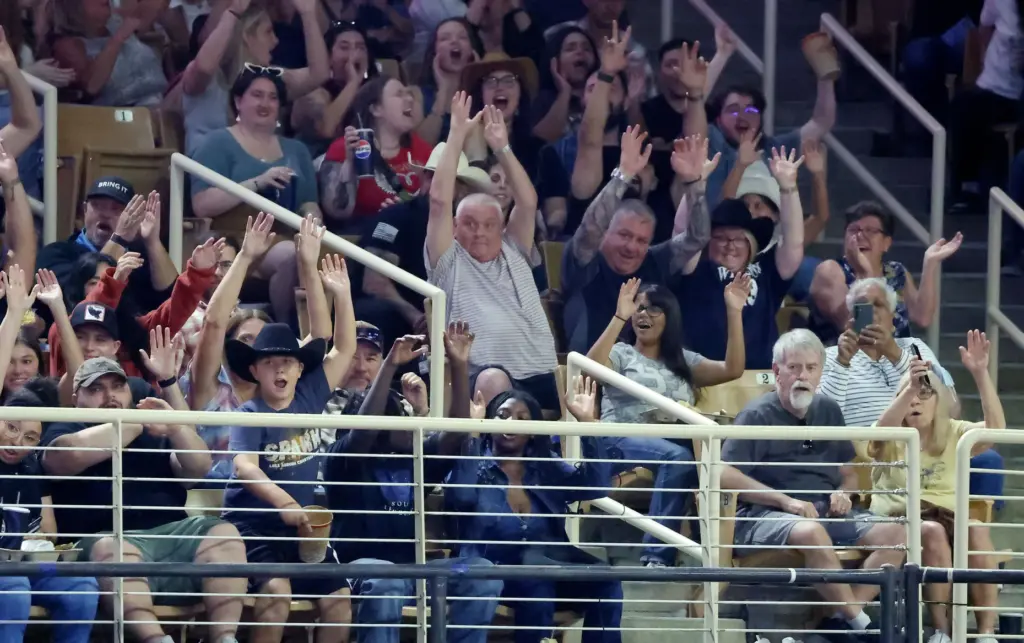Fans cheer during the Silver Spurs Rodeo at Silver Spurs...