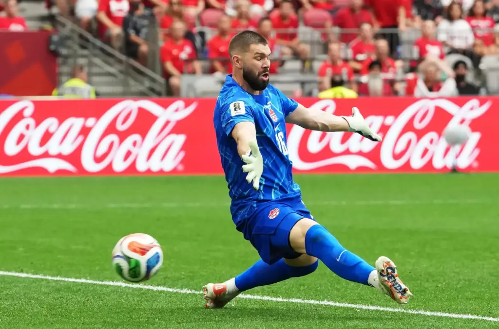 Canada goalkeeper Maxime Crepeau (16) is scored on by Switzerland’s...