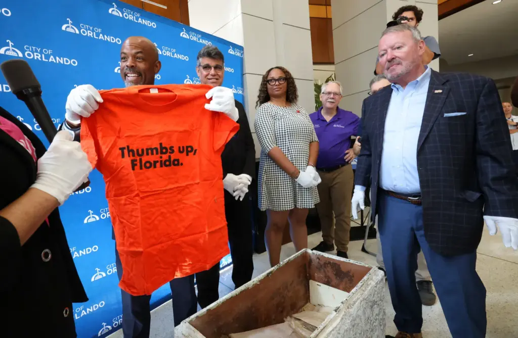 Orlando commissioner Bakari Burns reveals a 1976 T-shirt from the...