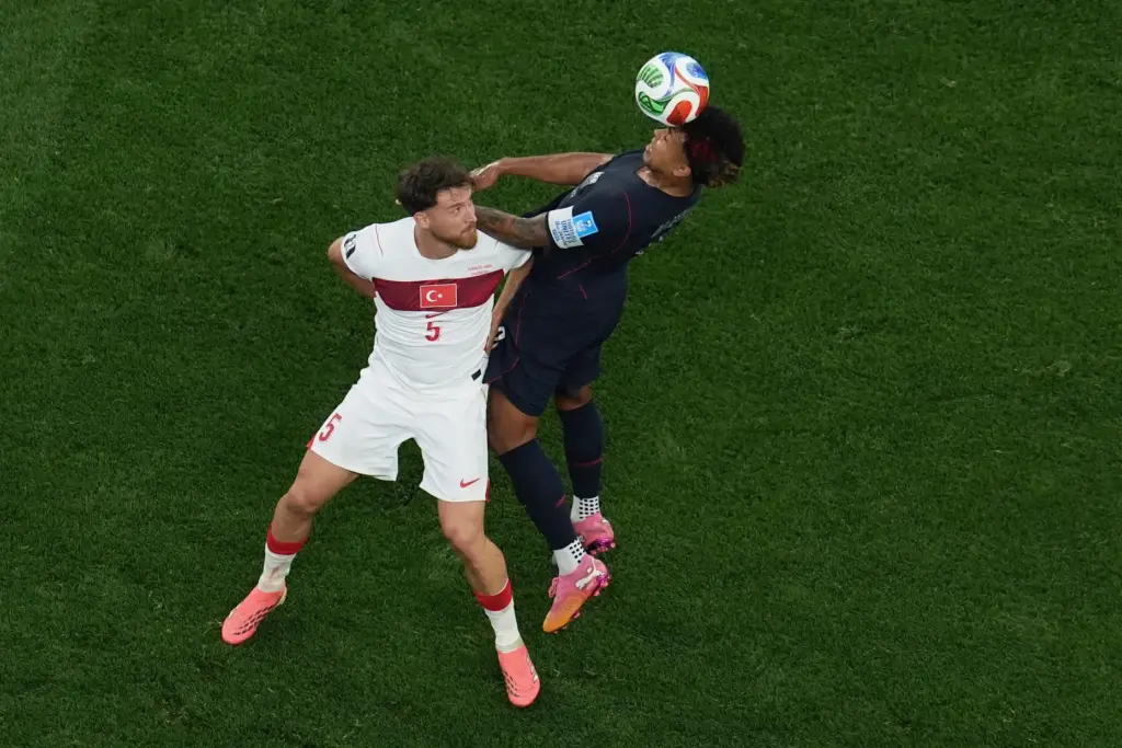 United States’ Weston McKennie, right, heads the ball against Turkey’s...
