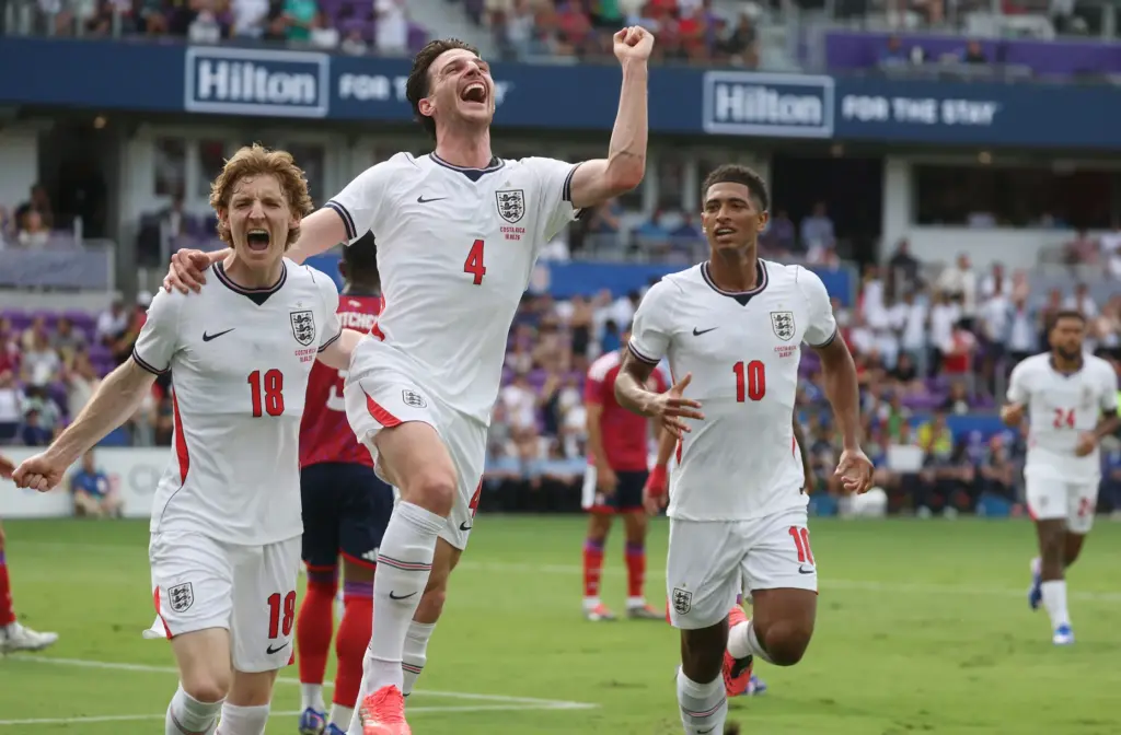 England players Anthony Gordon (18), Declan Rice (4), and Jude...