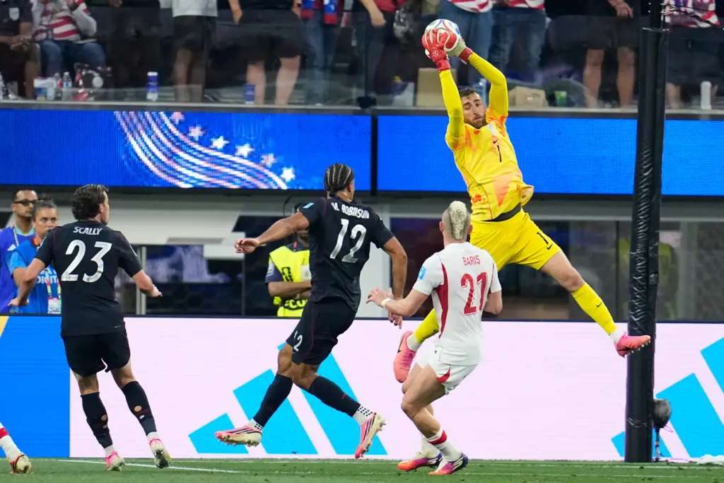 United States goalkeeper Matt Turner (1) takes the ball during...
