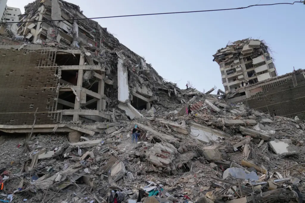 Residents search through the rubble two days after an earthquake...