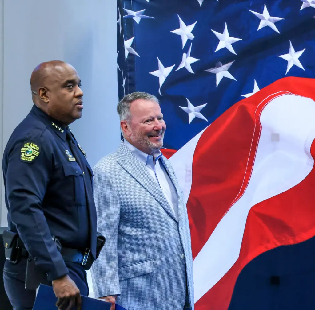 Orlando Police Chief Eric Smith and Mayor Buddy Dyer prepare...