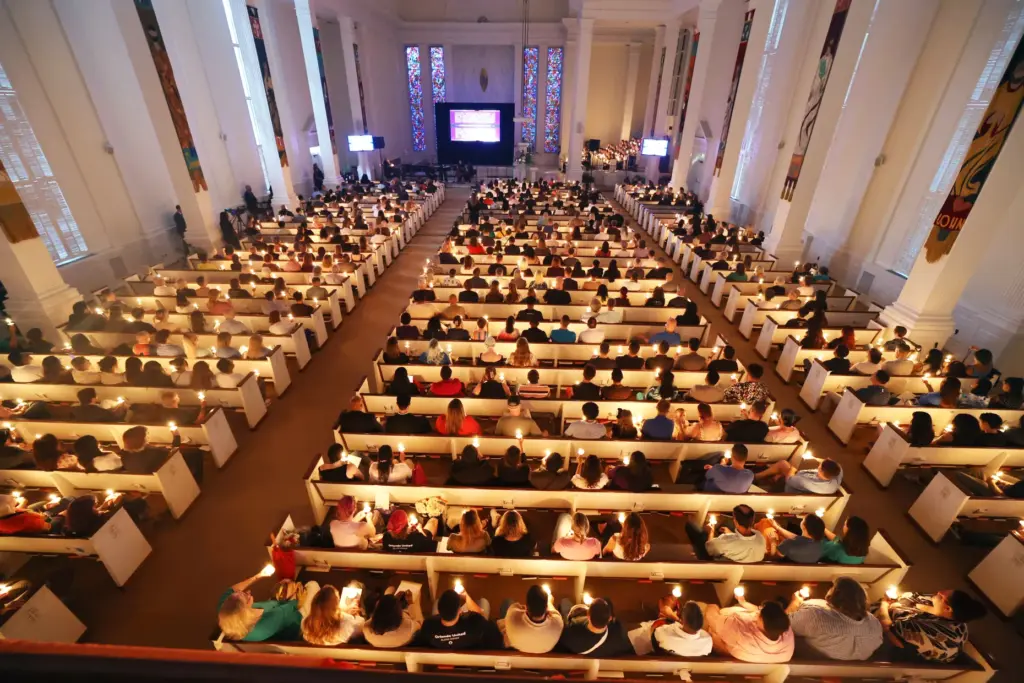 Candles are lit during the 2026 Pulse Day of Remembrance...