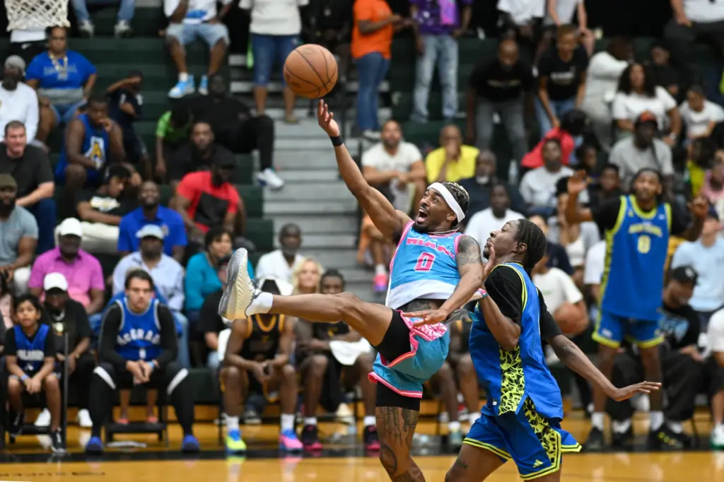 Team Miamiâs James âByrdâ Daniel (0) goes up to shoot...