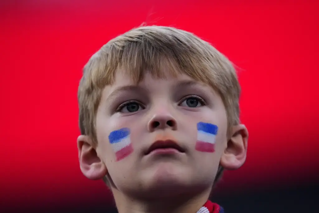 A fan waits for the start of a World Cup...