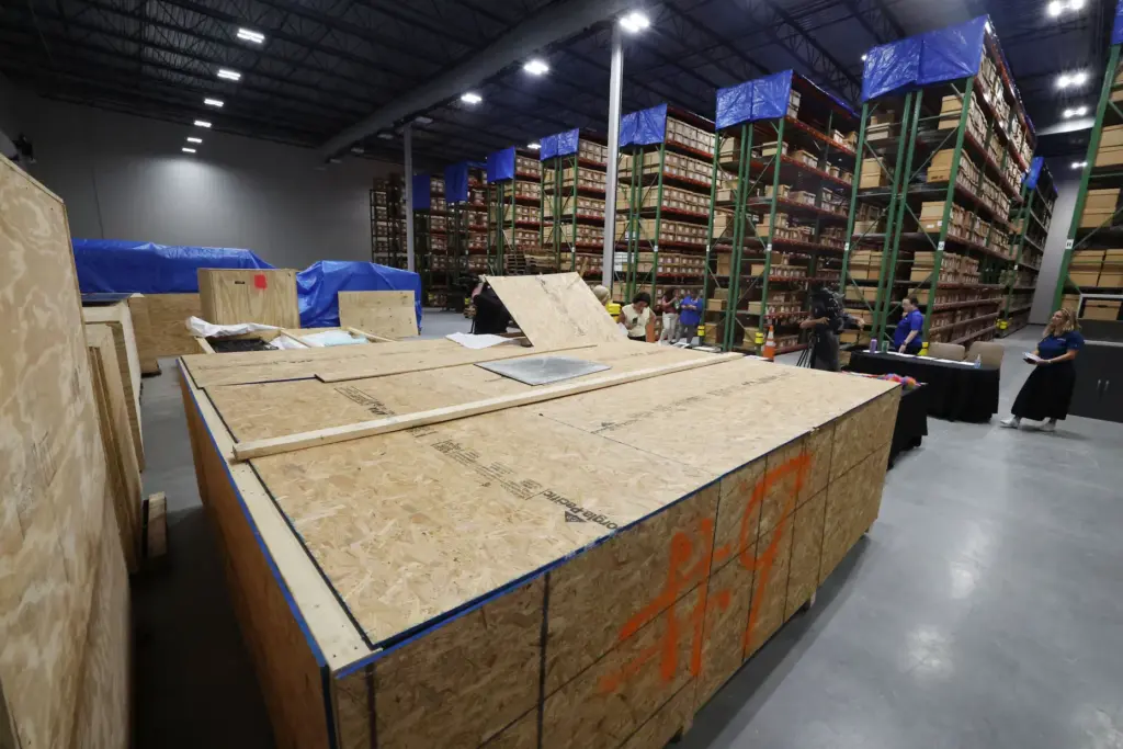 A large crate containing the PULSE sign is among artifacts...