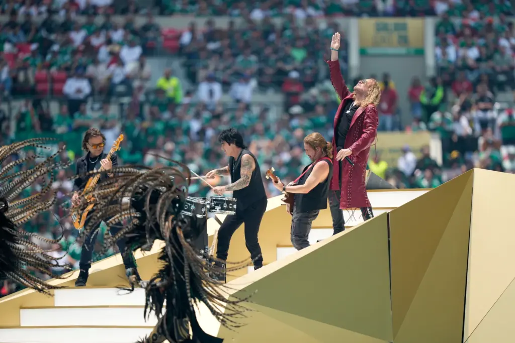 Mexican pop rock band Mana perform before the start of...