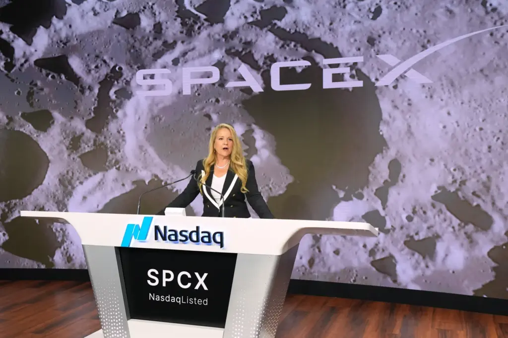 Gwynne Shotwell, President and COO of SpaceX, speaks during a bell ringing ceremony.