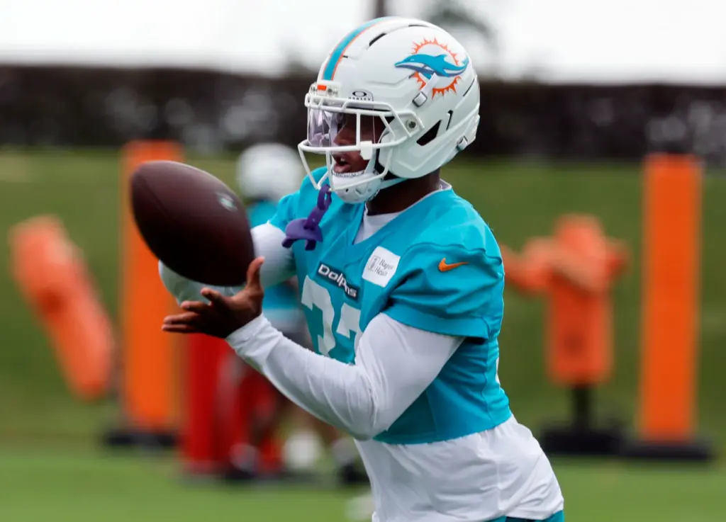 Miami Dolphins Lonnie Johnson Jr., cathes a ball during mandatoiry...