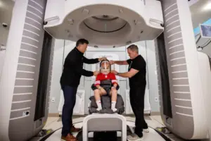 Stanford’s first proton therapy patient is 7. His case shows why the treatment matters