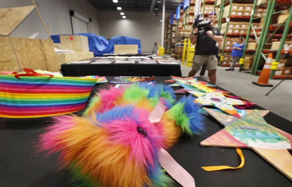 A colorful teddy bear is among artifacts and items collected...