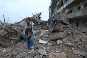 Venezuelans search rubble for survivors after 2 strong quakes kill at least 188
