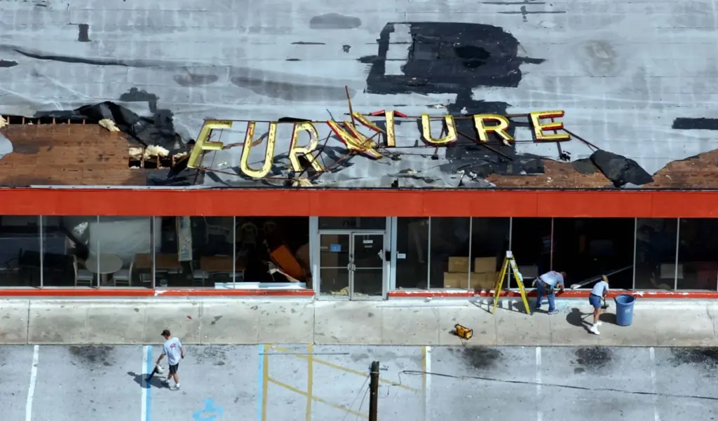 The sign for a furniture business on Highway 50 was...