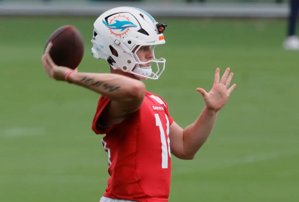 Miami Dolphins quarterback Quinn Ewers throws a pass during mandatory...