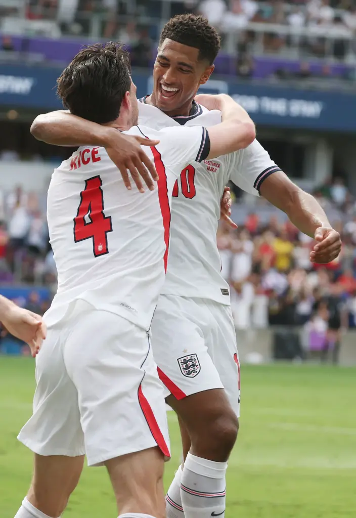 England players Declan Rice (4) and Jude Bellingham (10) celebrate...