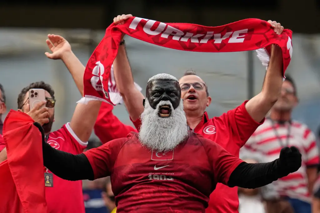 Turkey fans react ahead of the World Cup Group D...