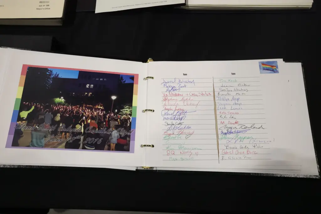 A guest book is among artifacts and items collected after...