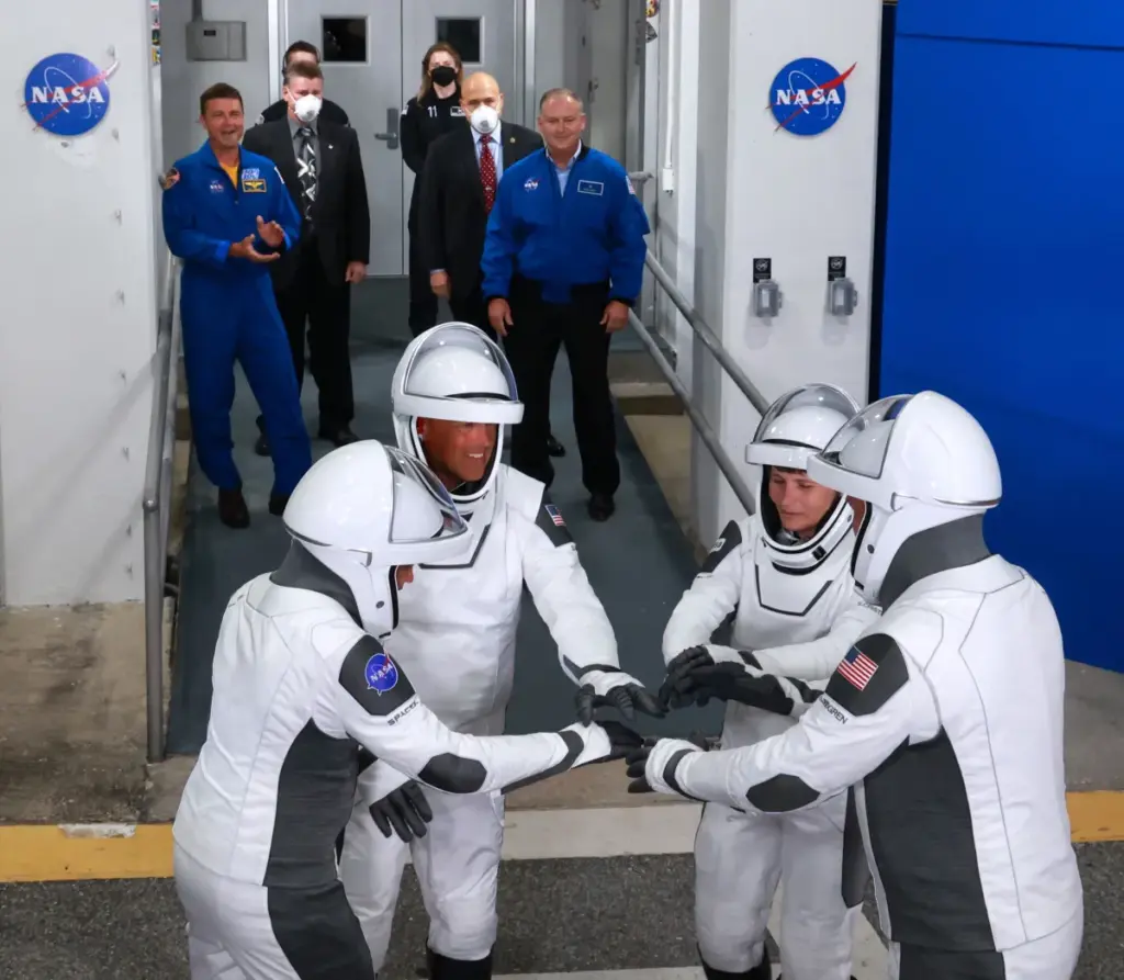 The astronauts of the NASA Crew-4 mission gather for a...