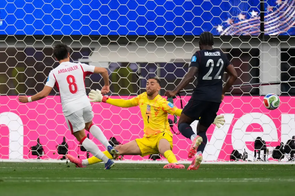 Turkey’s Arda Guler (8) scores their first goal against the...